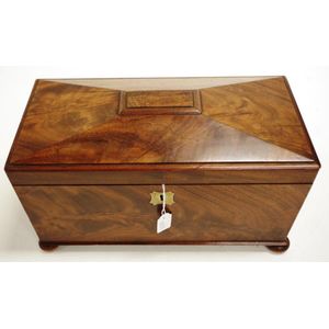 Late Georgian flame mahogany sarcophagus tea caddy with 2…