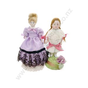 Bisque shoulder plate doll and all bisque doll, both with…