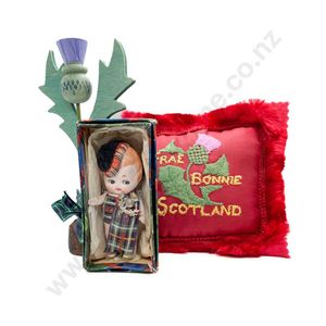 Small all bisque character doll, painted features wearing…