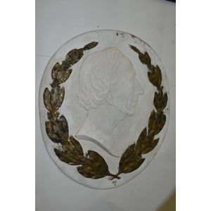 Cast iron garden plaque, depicting a Roman bust with laurel…