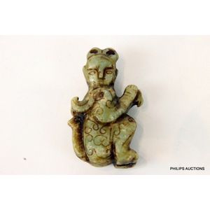 A Pre-Columbian style carved green stone amulet, Central…