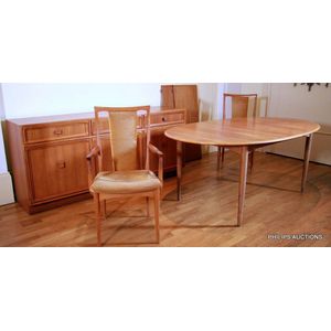 An eight piece vintage Parker teak dining suite, 1960s, with…