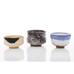 Three Japanese Chawan bowls, glazed earthenware, comprising an…