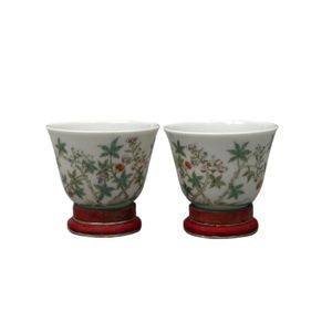 A pair of famille rose wine cups, Daoguang seal marks, 20th…