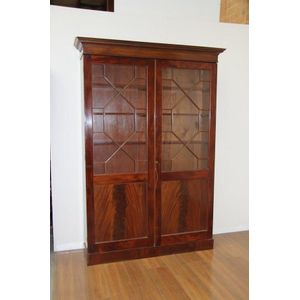 A tall English flame mahogany two door library bookcase, 202 cm&hellip;
