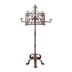 A heavy forged iron music stand with candle brackets, French,…