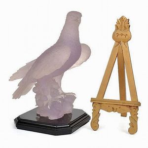 A resin model of a flacon and a painted wooden miniature easel,…