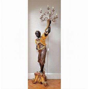 A polychrome and gilt wood blackamoor lamp stand, 209 cm high