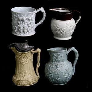 Victorian moulded jugs and a mug totalling four, mug decorated…