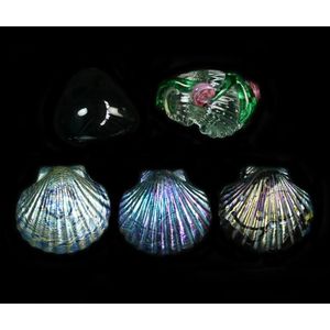 Colin Heaney art glass paperweights consisting of one dark…