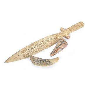 Three pieces of scrimshaw, including two whalebone teeth, one…