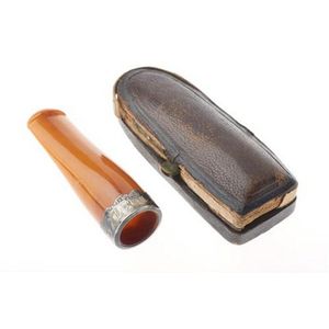 An Edwardian amber cigar holder, with silver finial, hallmarked…