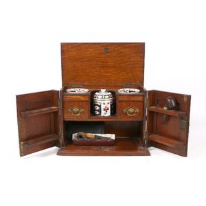 Smoker's cabinet. 19th century oak cabinet, two doors with…
