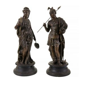Pair 19th century spelter figures. A warrior clad in the…