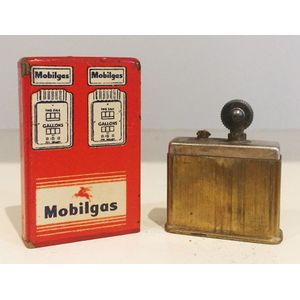 A novelty Mobilgas tin lithographed cigarette lighter, circa…
