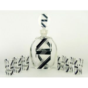 A seven-piece Art Deco black enamel and cut glass liqueur set,…