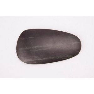 Melanesian Adze. Flattened ovoid form with sharp cutting edge,…