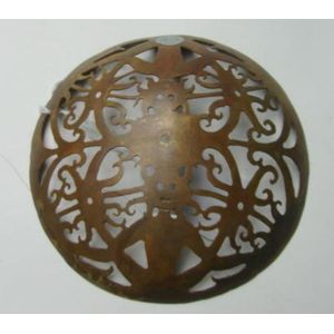 A Dayak brass hat ornament Borneo, Indonesia. Diameter 11.5 cm