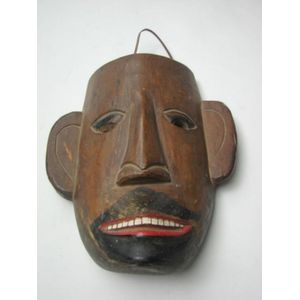 A Dayak mask Borneo, Indonesia. Length 24 cm