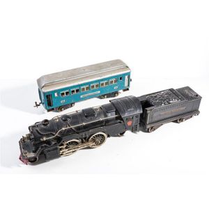 A Lionel pre-war standard gauge electric 2-4-2 locomotive and…