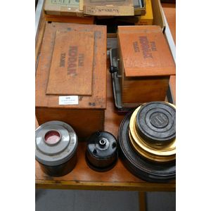 Six empty vintage film canisters a long with two Kodak film…