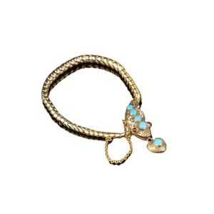 A Victorian serpentine bracelet, snake form with the head set&hellip;