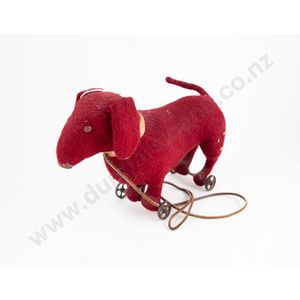 Vintage pull-a-long dog soft toy, on cast iron wheels 32 cm…