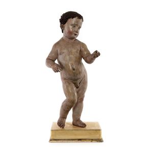 A very good polychrome painted and gesso figure of a cherub…