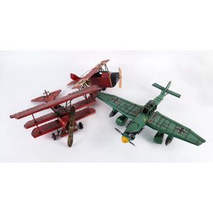 Three model planes, painted metal, 20th century, the longest 48…