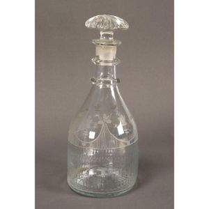 Georgian decanter and stopper, with a star cut saucer shaped…