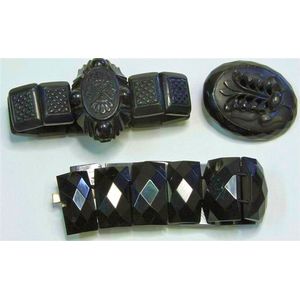 Three 19th century gutta-percha items; two bracelets and a…