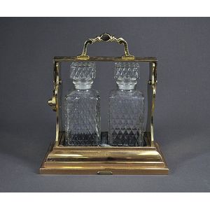 Betjemanns of London brass tantalus, with two probable…