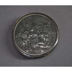 Early black composition patch box. Circular, with embossed…