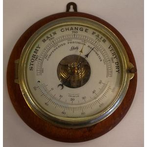 Vintage bulkhead barometer on timber backing, D23 cm approx