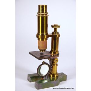 A Victorian brass and steel monocular microscope, 19th century,…