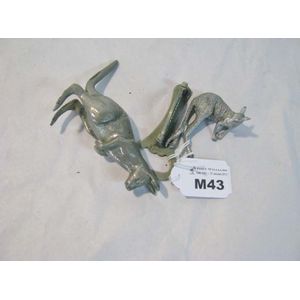 Two vintage metal kangaroos and a 'Harbour Bridge' bottle opener