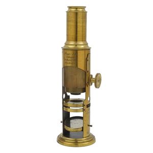 A brass drum microscope, Meyer & Co, 19th century, focusing by…