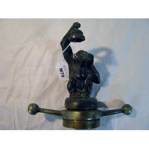 Vintage radiator cap of a monkey holding a lamp signed M Le…