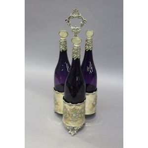 Antique silver on copper decanter stand with amethyst coloured…