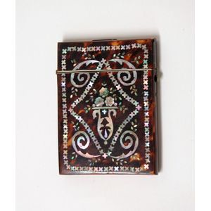A 19th century tortoiseshell ornately inlaid card case, both…