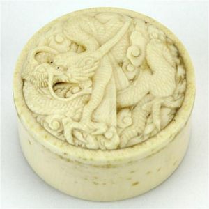 Republic ivory carved pill box with a screw in lid decorated…