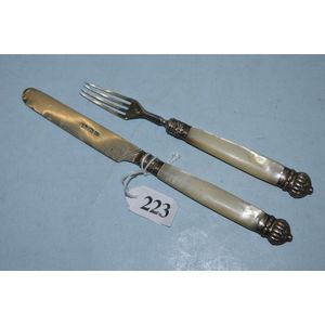 Silver and mother of pearl childrens fork and knife set,…
