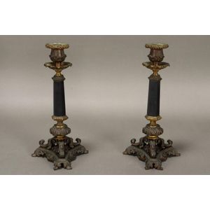 Pair of 19th century bronze and black onyx candlesticks, with…