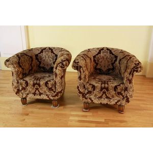 A pair of Art Deco tub chairs, circa 1920s-30s, the tub chairs…