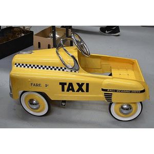 Modern childs metal peddle car, New York Taxi, in yellow and…