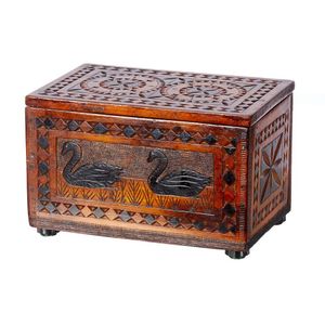 An Australian chip carved wooden casket, with an all over…