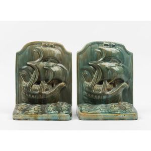 A pair of Mashman Brothers bookends, circa 1930, each modelled…