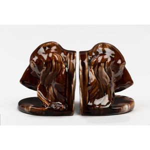 A pair of Mashman Brothers bookends, circa 1930, each modelled…