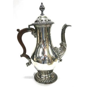 A Georgian style silver plate baluster coffee pot, William…