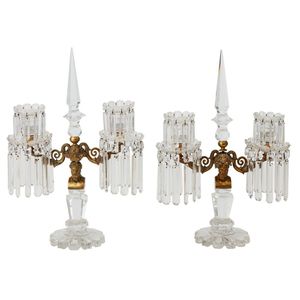 A pair of George IV brass and cut crystal twin-light lustres,…